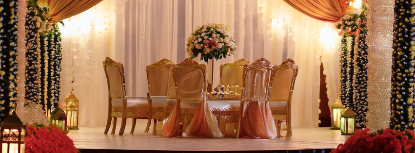 Marrakech wedding setup with lanterns, patterned textiles, and rich tones
